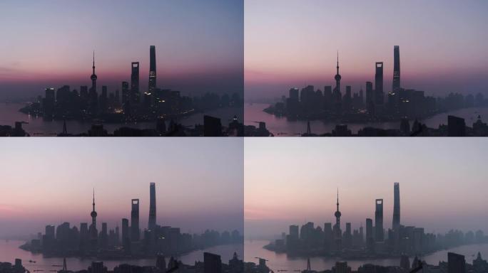 黎明时分上海天际线的T/L鸟瞰图，从夜间到白天/中国上海