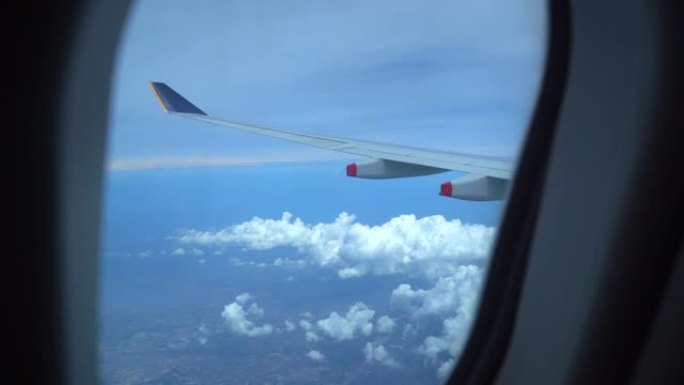 飞机窗口视图飞机航空航班飞向天空起飞滑行