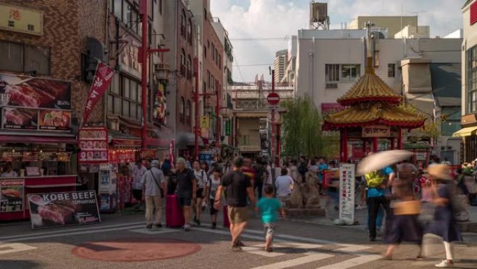 延时: 游客行人在日本神户南金町中国城拥挤