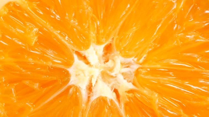 极端特写橙色水果剖面图内部果粒视频素材