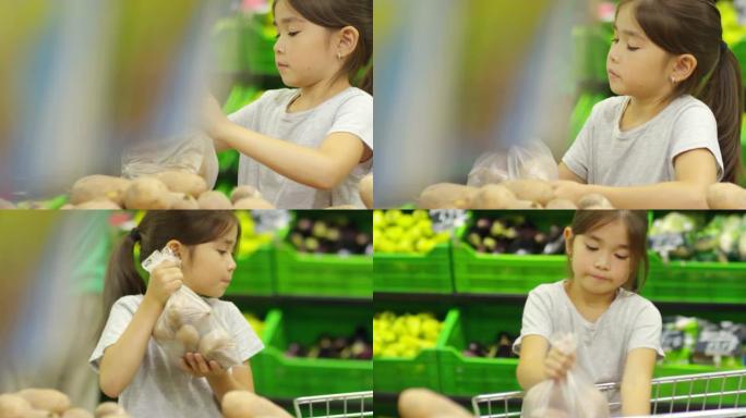 小女孩在超市买土豆