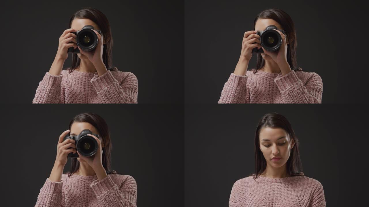 使用相机的女人使用相机的女人摄影师单反