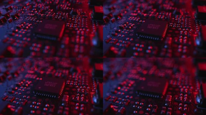 聚焦/不聚焦在微芯片、CPU处理器上。印刷电路板/计算机主板。电子设备内部，超级计算机的一部分。红色