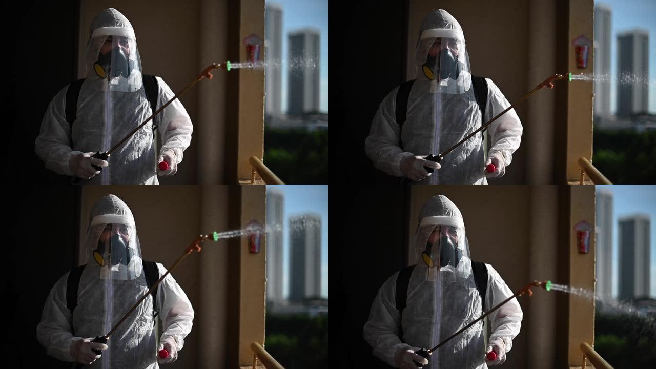 一名穿着防护服的人喷洒房屋并消毒房屋灭虫病毒