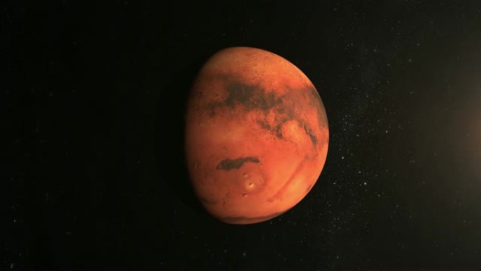 火星缓慢旋转。摄像机正在接近地球。火星的大表面被太阳照亮。从太空看。星星闪烁。4K.太阳在右边