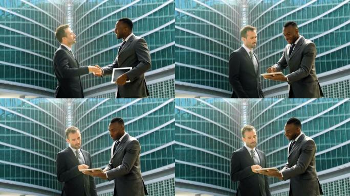 两个工业和营销或金融人士交谈并握手，以竞争一个重大项目。