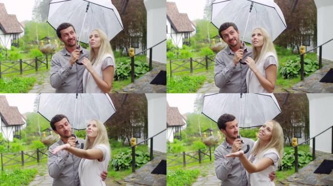 乡下有雨伞的夫妇视频素材