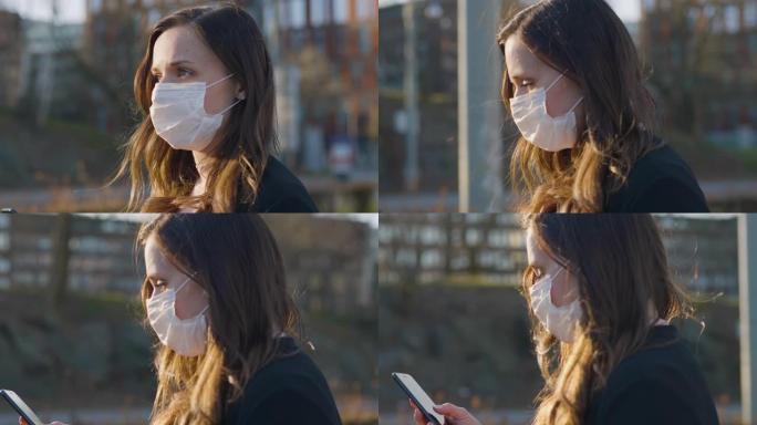 女性通勤者带防护医用口罩在城市里