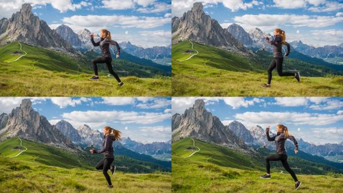 意大利多洛米蒂山区小径上慢跑的女性跑步者