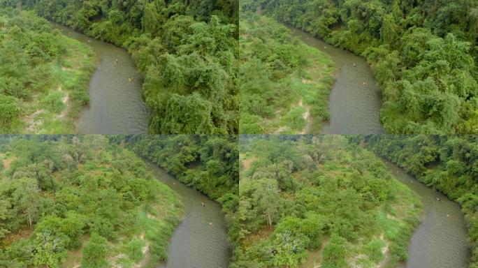 空中: 游客在雨林中进行独木舟旅行。