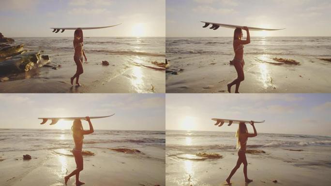 日落时分，冲浪板在头顶上方的沙滩上行走的冲浪女孩