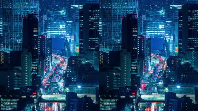 从日本东京六本木山森塔拍摄的垂直长时间曝光夜间交通延时