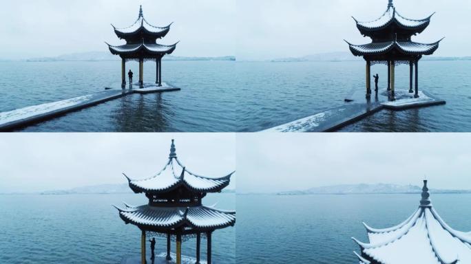 杭州西湖的展馆雪景，中式建筑