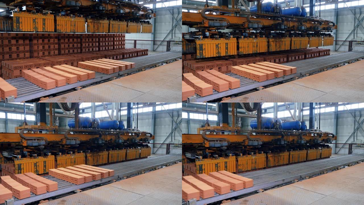工厂机器在设施中工作时会移动成堆的砖块。