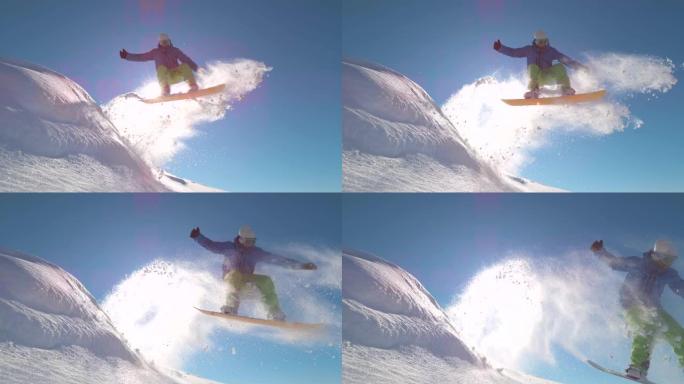 慢动作: 专业滑雪者在新鲜的雪中跳跃，在阳光下喷洒雪花