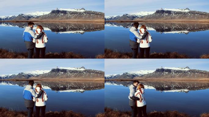 WS深情的夫妇享受冰岛风景优美的山和湖景