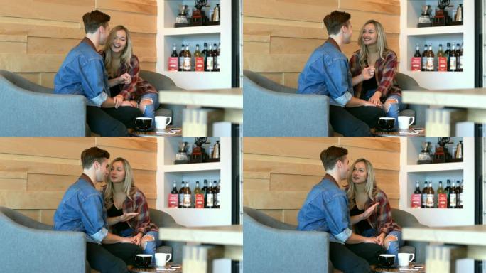 年轻浪漫情侣在4k咖啡馆互动