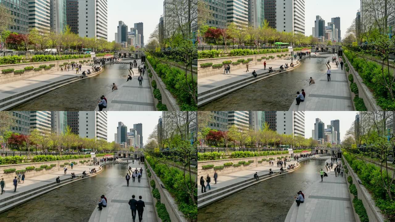 延时: 韩国西欧市中心清溪川运河的行人
