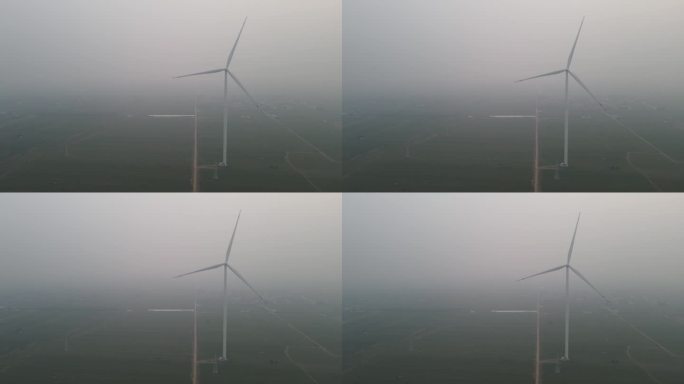 航拍风力发电大雾