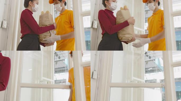 亚洲送货员在冠状病毒检疫期间向亚洲女性顾客运送食品杂货