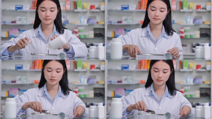 亚洲女药剂师在药房正确装瓶之前先计算处方药。专业，医学，医疗保健，医学教育，制药部门，STEM，创新