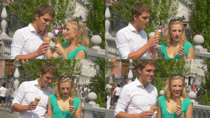 特写: 男人在吃冰淇淋和探索卢布尔雅那时亲吻女友。