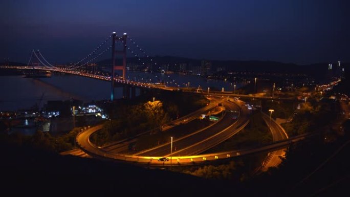 中国香港青衣区马大桥运输的4k分辨率时间流逝。日落，蓝色时刻。