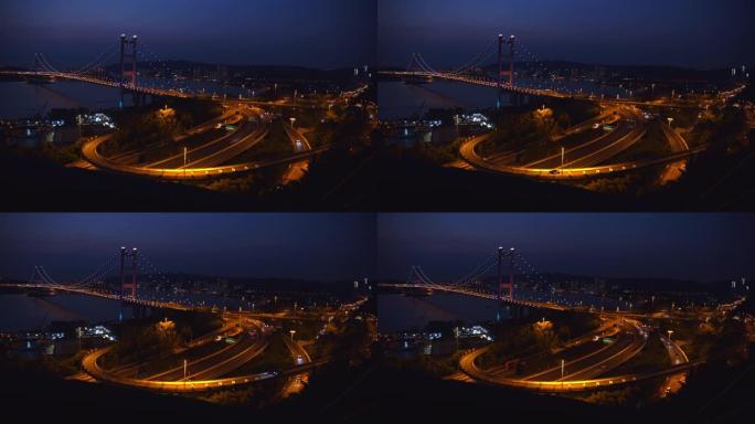 中国香港青衣区马大桥运输的4k分辨率时间流逝。日落，蓝色时刻。