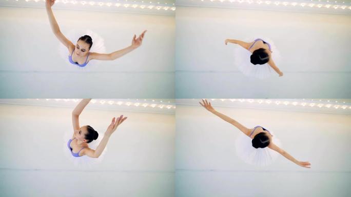 一位芭蕾舞女舞者旋转的俯视图