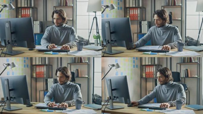 坐在办公桌前的创意企业家在时尚办公室的台式计算机上工作。富有艺术气息的英俊长发西班牙裔男子使用电脑