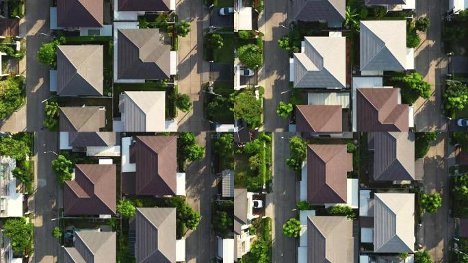 无人机在一个村庄的屋顶上飞行的录像带，早晨的阳光为居住，城市社会或繁荣的城市社区的概念增添了维度。