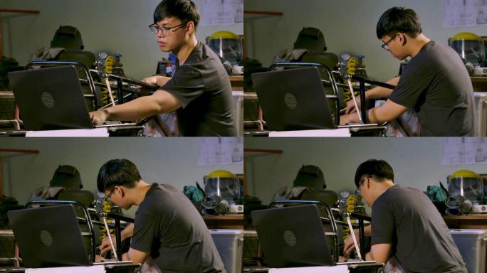 在工作室车间工作的年轻亚洲机械工程师。技术与创新理念。