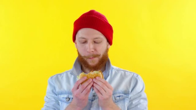 男人吃三明治的肖像