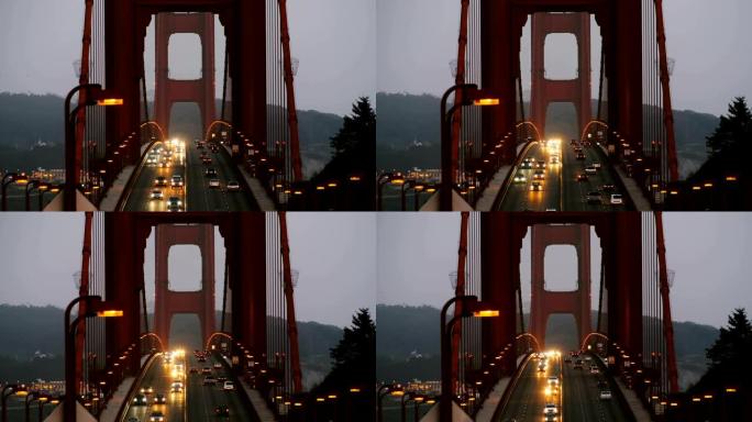 日落后，美国旧金山标志性金门大桥上深夜汽车交通路灯的美丽景色。