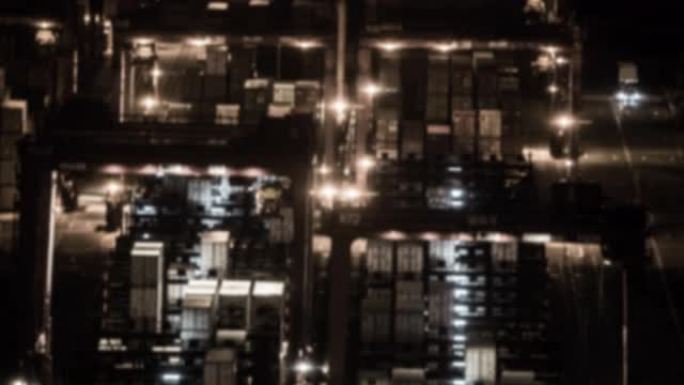 延时: 香港青衣港海上集装箱港口和货场夜间模糊背景工作