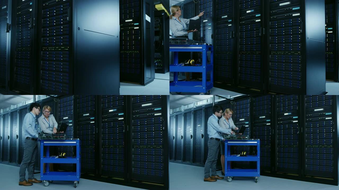 在现代数据中心: 工程师和IT专家在推车设备上使用服务器机架来安装新硬件。负责数据库维护和诊断的专家