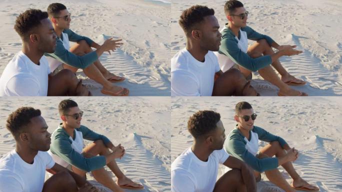 两个年轻的成年男性朋友在海滩上放松4k