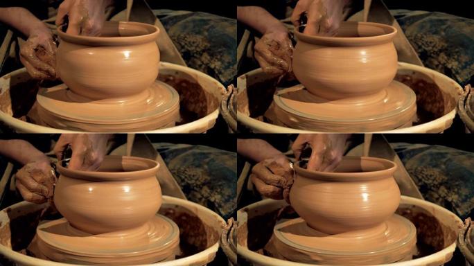 粘土花瓶打开陶轮，特写。