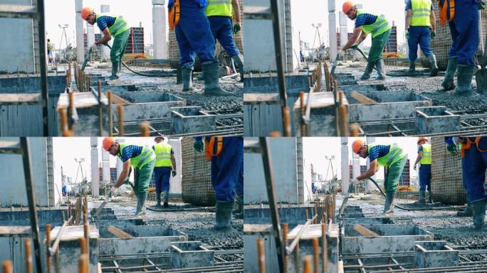 建筑商在施工现场使用混凝土。