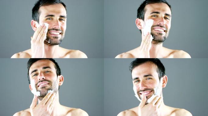 一幅美丽的男人肖像，剃须前使用剃须泡沫，更好地完美剃须，保护你的皮肤免受刺激。