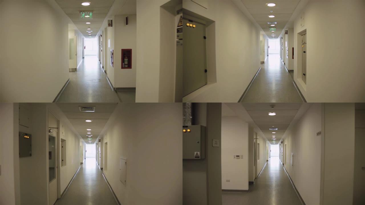 一座现代化办公楼的长长的走廊内部。