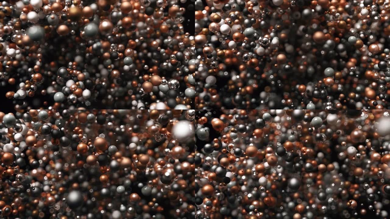 带有金属球的抽象图形背景。高质量的3d渲染。纹理球在黑色孤立的bacgkround上以混乱的方式移动