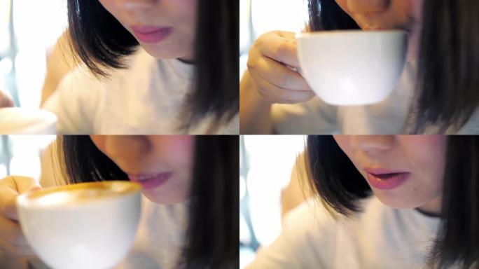 女人的脸特写喝咖啡，喝咖啡，慢动作