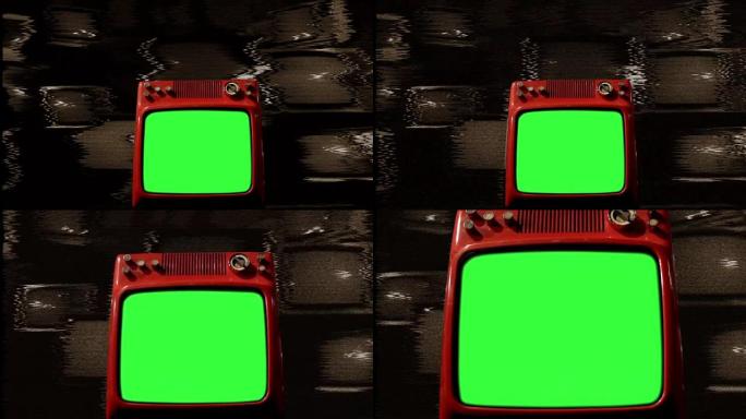 许多电视中间的旧红色电视绿屏。信号不好。棕褐色色调。