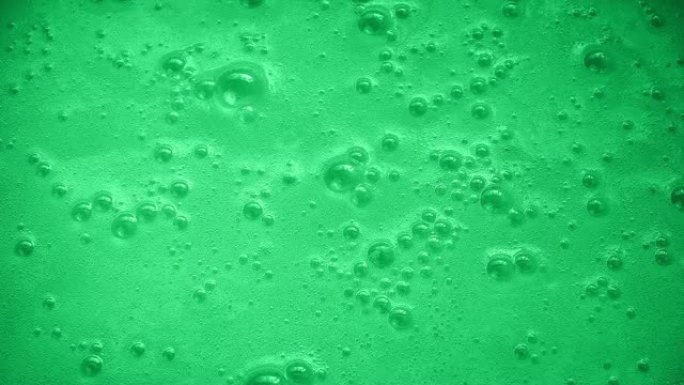 绿色的嘶嘶表面气泡背景
