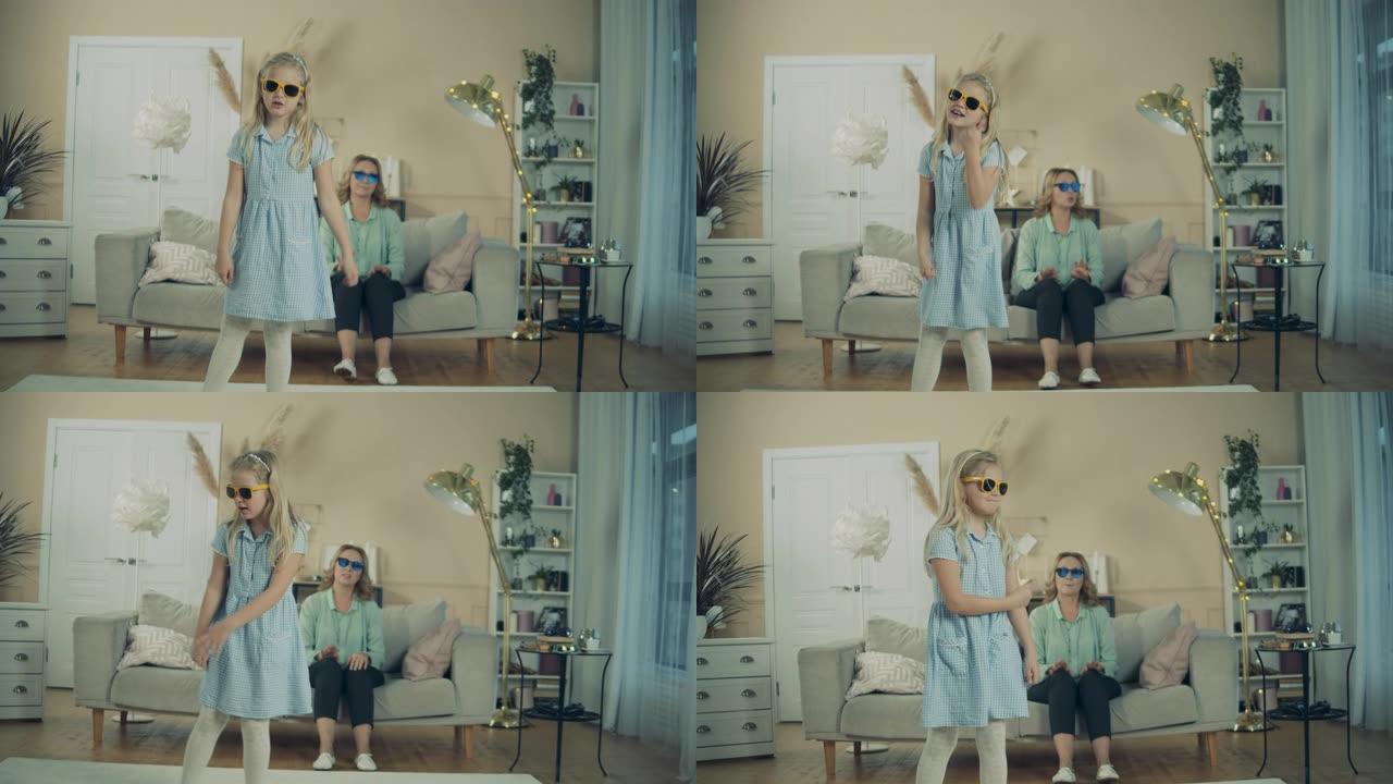 小女孩和她的奶奶戴着墨镜跳舞