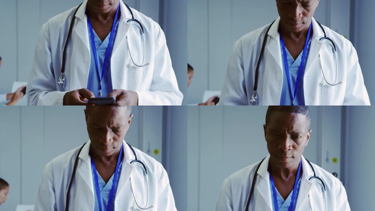 非裔美国男医生在医院使用手机的特写4k