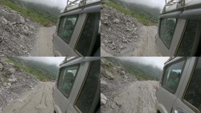 POV: 回望尼泊尔农村土路边的小型挖掘机