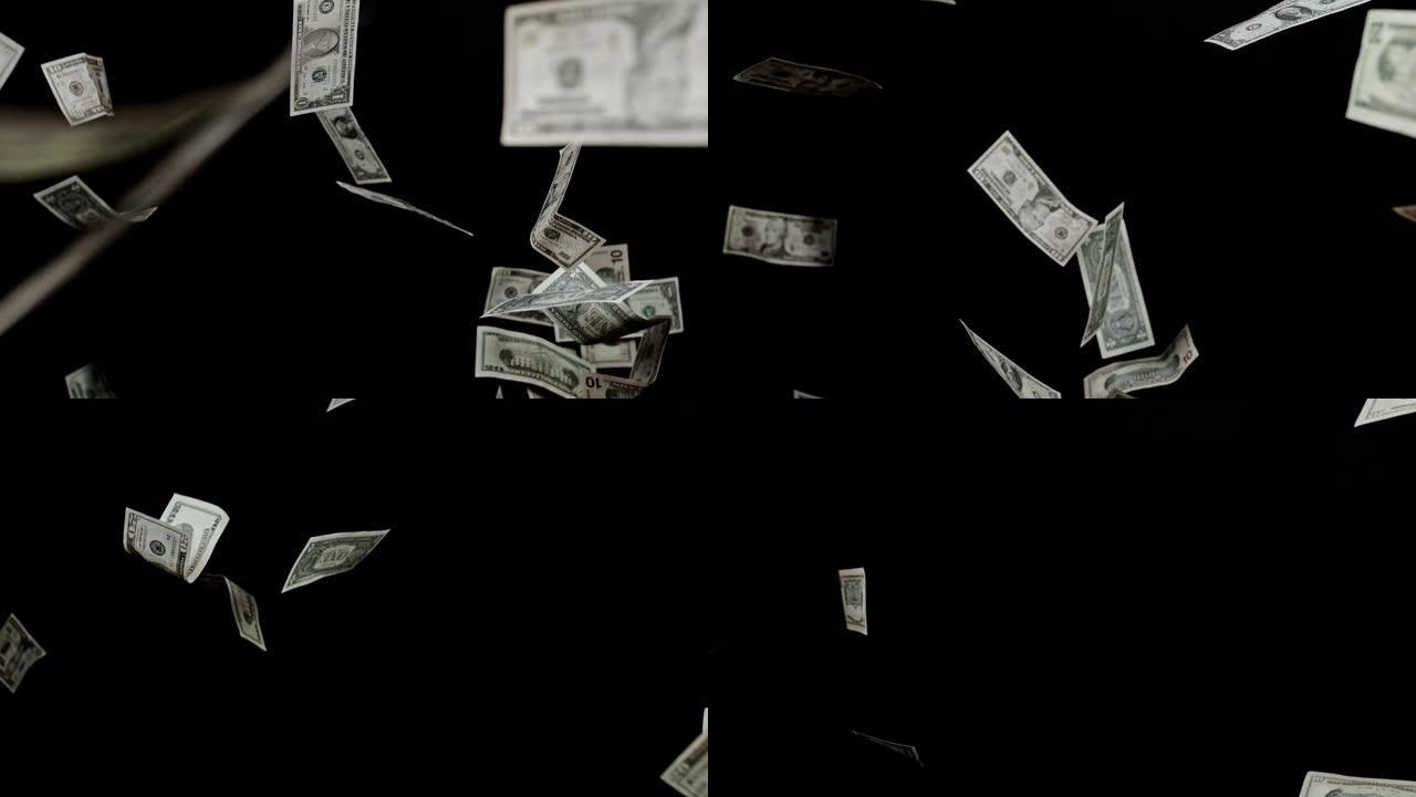 黑色背景上的SLO MO飞行美元钞票