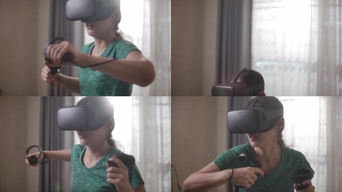 亚洲妇女使用VR眼镜玩拳击游戏在家锻炼